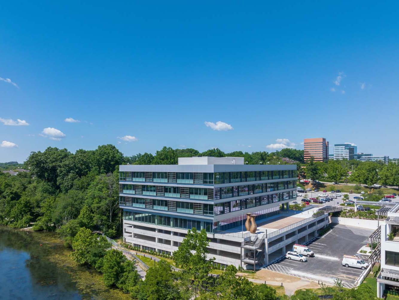 10285 Merriweather District building under a clear blue sky.