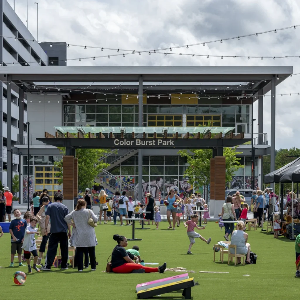People play and gather in Color Burst Park at Merriweather District, Columbia, Maryland.