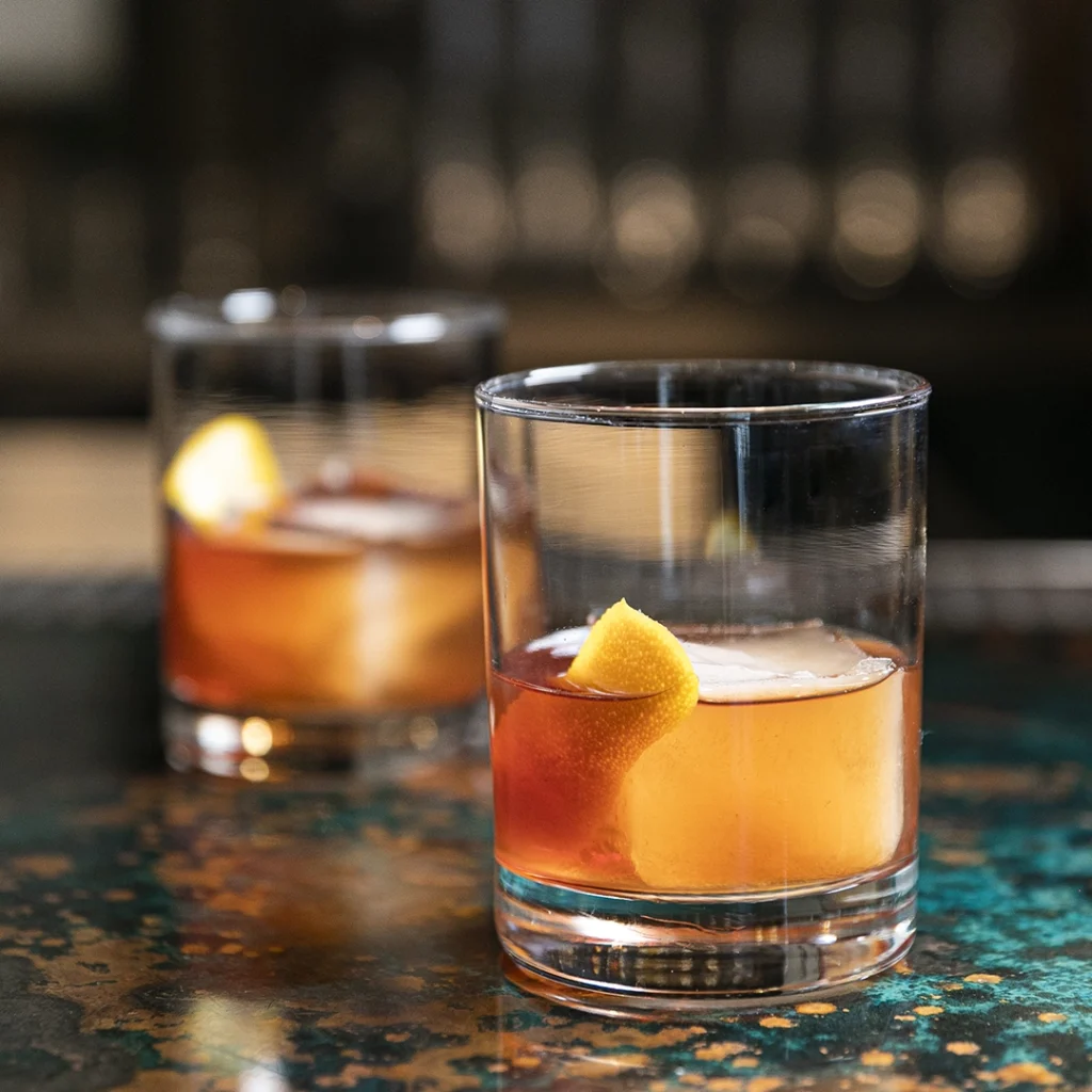 Cocktails displayed from Cured & 18th/21st at Merriweather District.