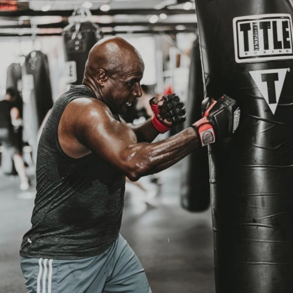Man boxes at Title Boxing Club.