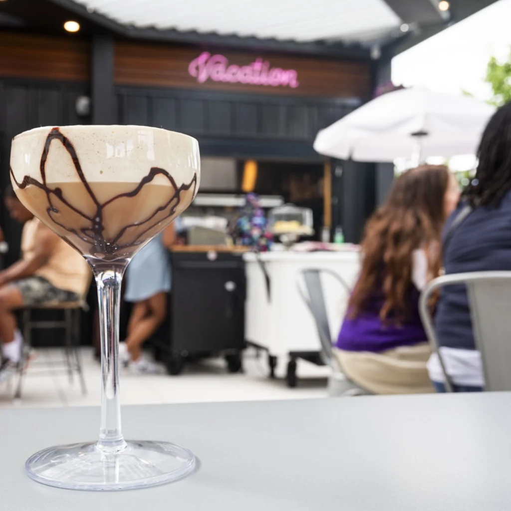A espresso martini on a table at Vacation.