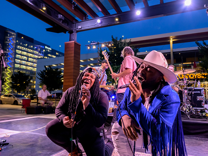 Musicians perform at Amped Summer Series at Merriweather District.